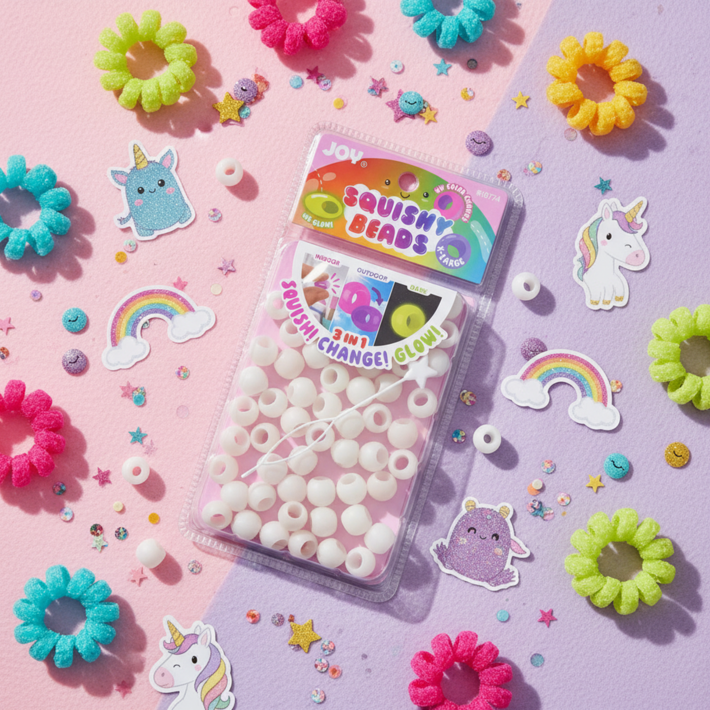 Joy XL Round Squishy Hair Beads large pack glowing white beads with colorful scrunchies and unicorn stickers on pink background