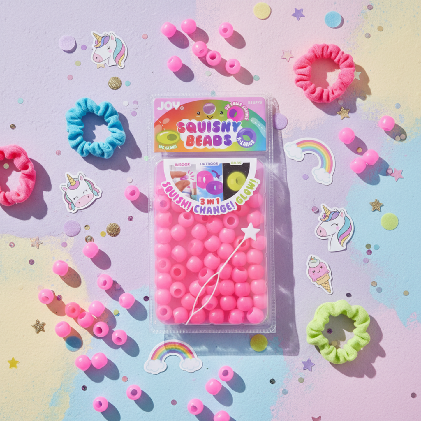 Joy XL Round Squishy Hair Beads large pack in pink with UV glow-in-dark feature and colorful scrunchies on pastel background