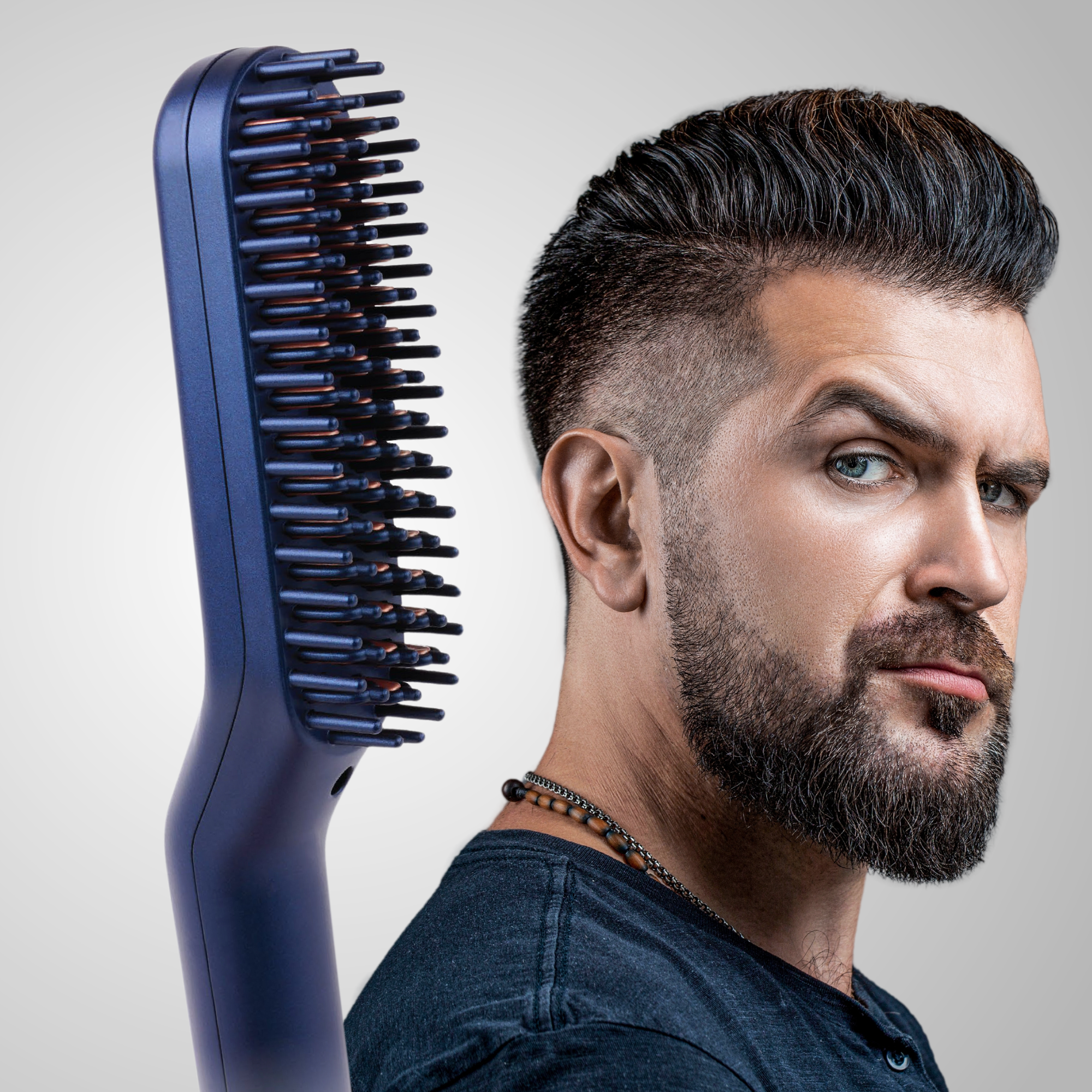 Man with beard beside beard straightener demonstrating its effectiveness 