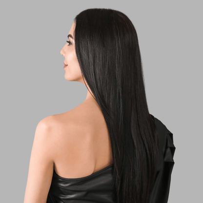 Woman with long, sleek, shiny black hair wearing a black off-shoulder top, showcasing smooth hair texture and shine.
