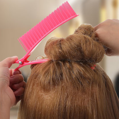 Pink Annie sectioning comb grip clip holding up blonde hair twisted in a bun for styling and sectioning purposes