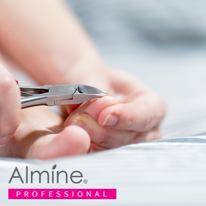 Close-up of professional stainless steel nail clippers trimming toenails as part of Almine Pedicure Set care routine