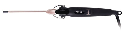 A hair styling tool with a black handle, rose gold barrel, and black cord, shown against a plain white background.