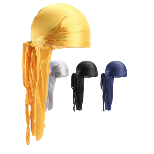 Four satin durags in yellow, silver, black, and navy blue arranged on a white background