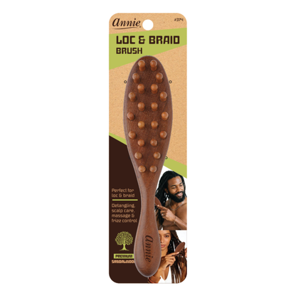 Sandalwood textured oval paddle brush with rounded wooden bristles, designed for detangling, scalp care, and frizz control on loc and braid styles for textured hair.