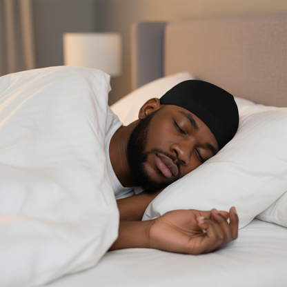 A man peacefully sleeping wearing Mr. Durag Cotton Dome Cap, 1 Count, Black, made from breathable cotton fabric for comfortable overnight hair protection and wave maintenance.