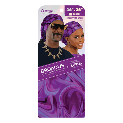 Broadus Collection Headwrap Scarf by Shante & Snoop Dogg, Purple Butterfly shown in vibrant purple swirl print on packaging featuring models wearing matching headwraps promoting lupus awareness.