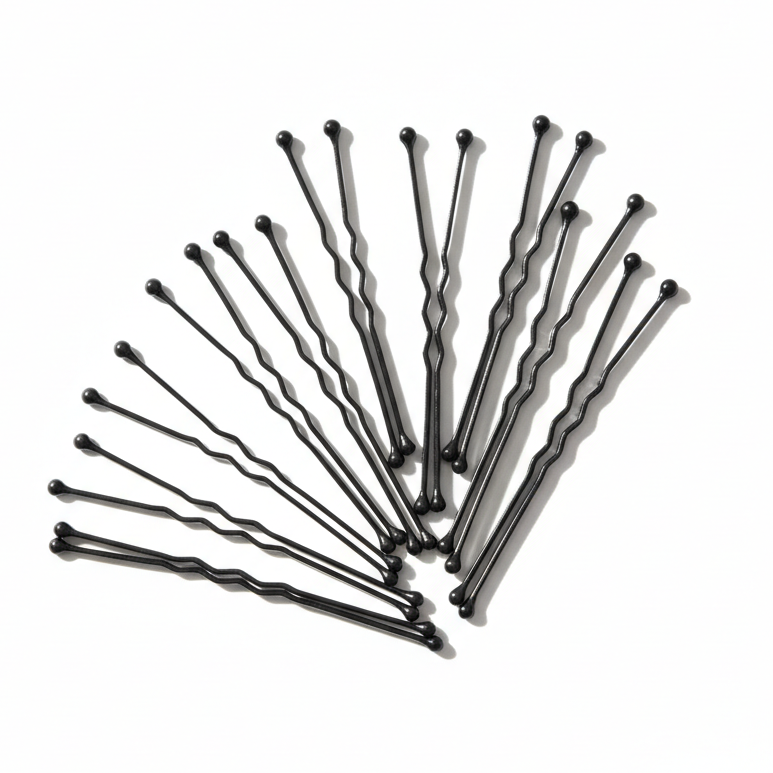 Annie Jumbo Bob Pin 3 Inch, 80 Count, Black displayed fanned out to highlight durable metal construction with rounded tips for secure, comfortable hairstyling and professional results.