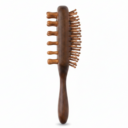 Rectangular sandalwood hair brush with ergonomic handle and widely spaced wooden bristles designed for detangling and styling textured and multicultural hair gently and effectively.