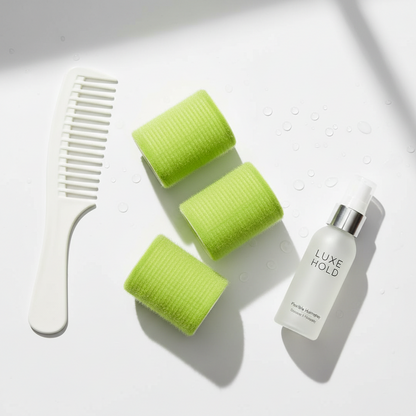 Three lime green self-gripping hair rollers with velour texture arranged beside a white wide-tooth comb and a small clear spray bottle labeled Luxe Hold, set on a white surface.