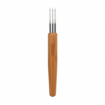 Annie Dreadlocks Crochet Needle 3 Hook 0.75mm, 1 Count, Wood with three fine metal hooks and a smooth wooden handle engraved with the Annie logo for detailed dreadlock styling and maintenance.
