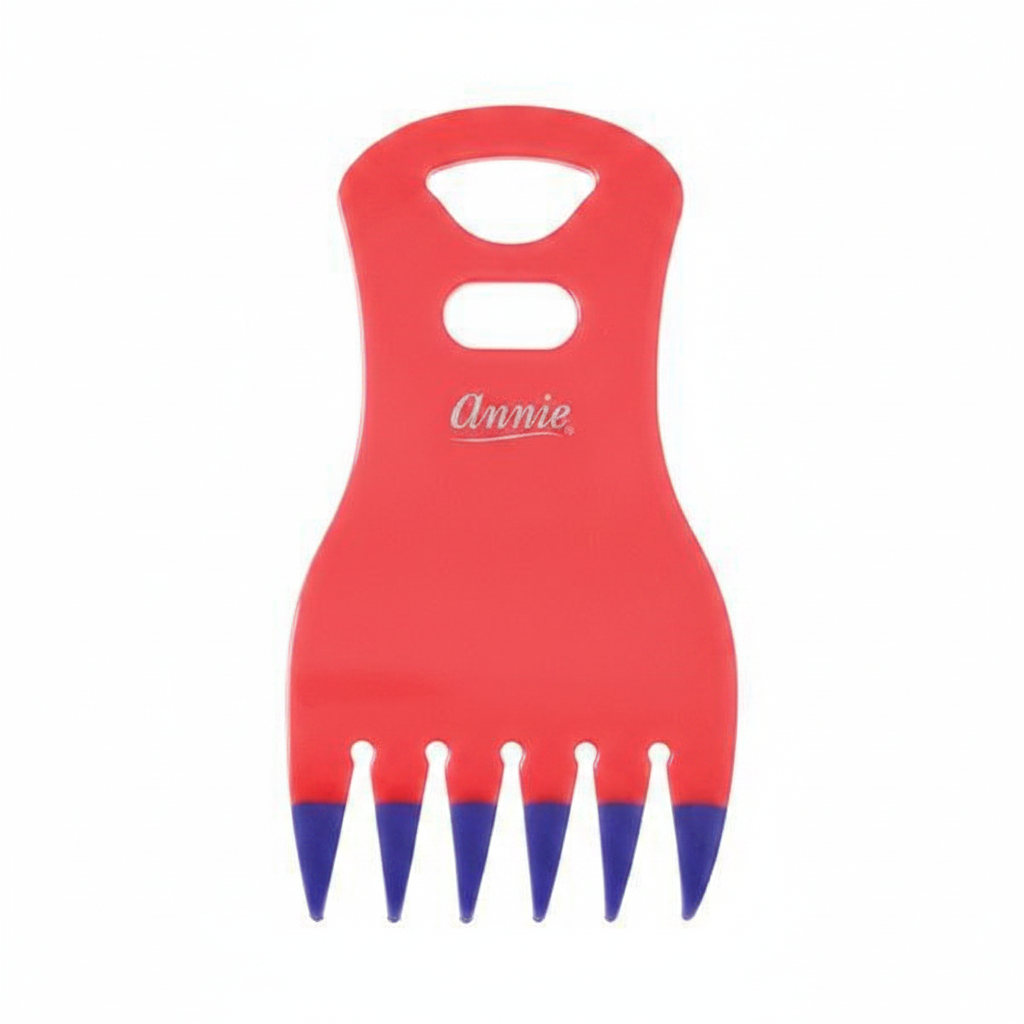 Red claw comb with blue-tipped teeth and ergonomic handle, designed by Annie for easy detangling and styling of textured, natural, and multicultural hair.