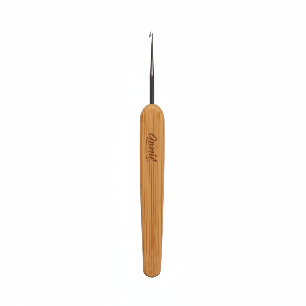 Annie Dreadlocks Crochet Needle 1 Hook 0.75mm, 1 Count, Wood featuring a smooth wooden handle with the Annie logo and a fine metal hook designed for precise dreadlock styling and maintenance.