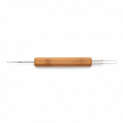 Annie Dreadlocks Crochet Needle 2 In 1 0.75mm, 1 Count, Wood featuring dual metal hooks and a smooth, natural wood handle designed for precise and durable dreadlock maintenance.