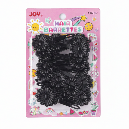 Pack of 20 black flower-shaped barrettes on pink card with colorful playful graphics, designed for easy use on textured and multicultural hair by Annie International.