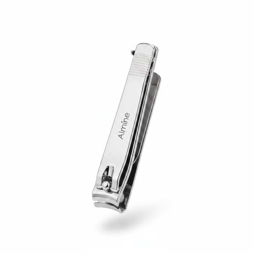 Silver large toenail clipper with built-in file, designed for precise grooming and durability, featuring the Almine brand engraving on the handle.