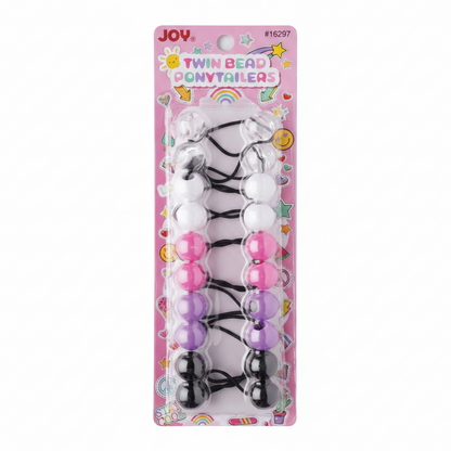 Set of 10 Joy twin bead ponytail holders in black, white, pink, and purple on a pink card, designed for secure, snag-free hold on textured hair.