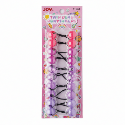 Pack of assorted clear-tone twin bead hair ties designed for firm, snag-free hold on textured and natural hair, supporting protective and stylish ponytails.