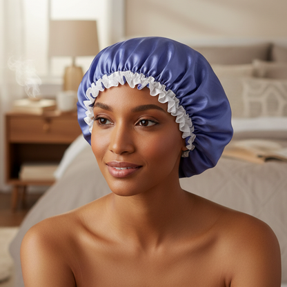 Woman wearing a medium-sized purple satin bonnet with white elastic trim, designed to protect and maintain textured hair with gentle moisture retention during sleep or styling.