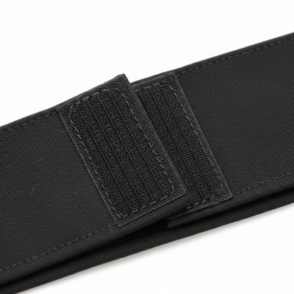 Close-up of a black synthetic spandex hair band featuring a strong hook-and-loop fastener for secure, comfortable hold on textured hair styles.