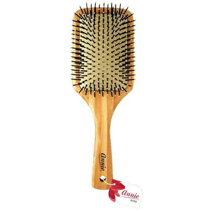 Wooden paddle brush with nylon bristles and cushioned base, designed by Annie International for gentle detangling and smoothing of textured and multicultural hair types.