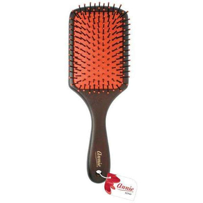 Wooden paddle brush with nylon bristles and red cushion base, designed by Annie for gentle detangling and smoothing of textured and multicultural hair types.