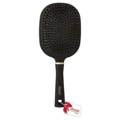 Black paddle hairbrush with densely packed 100% boar bristles, designed by Annie International for gentle, effective detangling and smoothing of textured hair.