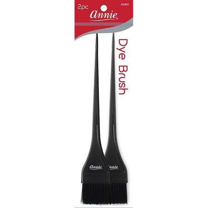 Two black hair dye brushes with long pointed handles, packaged on a red and gray branded card, designed for precise application of hair color.