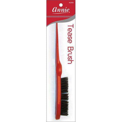Red plastic tease brush with a pointed tip and densely packed bristles, designed for precision styling and volumizing textured and natural hair by Annie International.