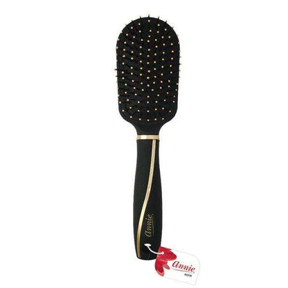 Black cushion paddle brush with ball-tipped bristles and gold detail on handle, designed by Annie International for gentle detangling of textured and natural hair.