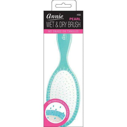 Teal oval detangling brush with pearl-tipped flexible bristles and rubberized handle, designed for snag-free styling on wet and dry textured hair.