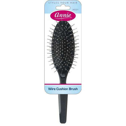 Small black wire cushion brush with a comfortable handle, designed for detangling and styling textured, natural, and multicultural hair with ease and care.